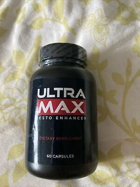 Photo of a container with UltraMax Testo Enhancer capsules from a review by Heinrich of Berlin
